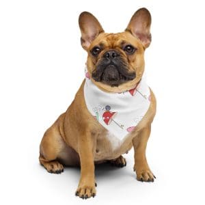 Adorable pet wearing the Snail & Butterfly eco-friendly pet bandana, featuring vibrant characters from the children's book